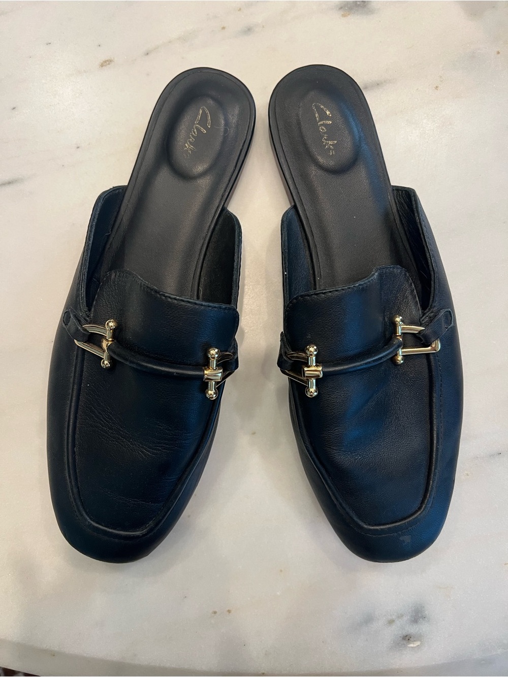 Clarks Black Leather Slip-On Mules with Gold Hardware